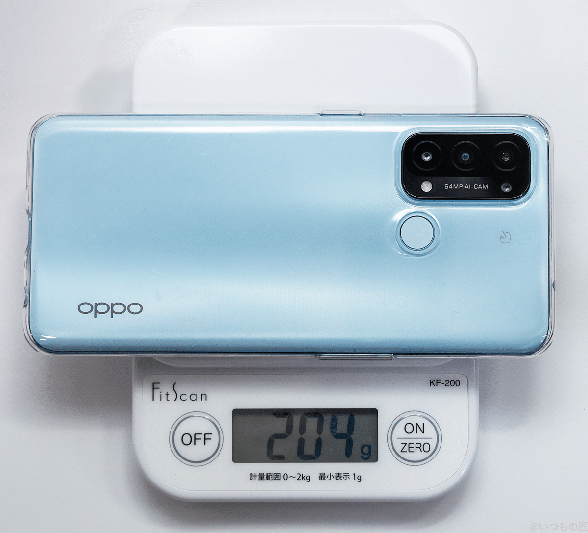 OPPO Reno5Aを標準添付のケースに入れて計量器で計測すると、204gです。